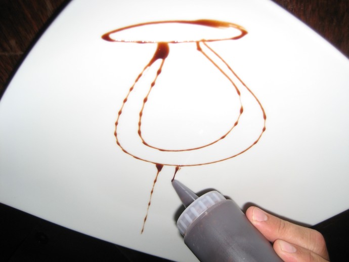 Step 2 -- the design outline is made with liquid chocolate.