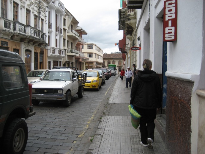 Cuenca has busy streets and narrow sidewalks (this was one of the wider ones)